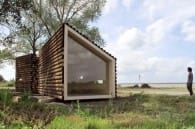 refugio de troncos de madera Flake House