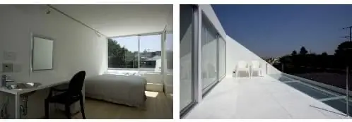 dormitorio y terraza de casa minimalista