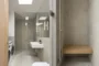 Cuarto de baño con lavador y secadora